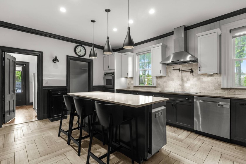 A striking blend of authentic farmhouse architecture and modern - photo 15