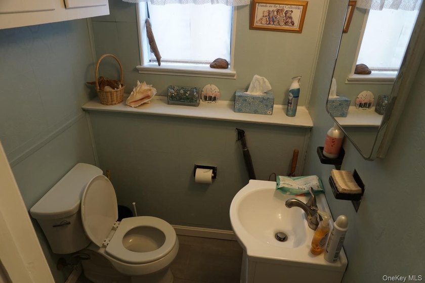 This split-level home in Lindenhurst features four spacious - photo 11