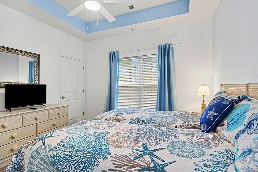 Welcome to this beautifully furnished third-floor condo located - photo 15