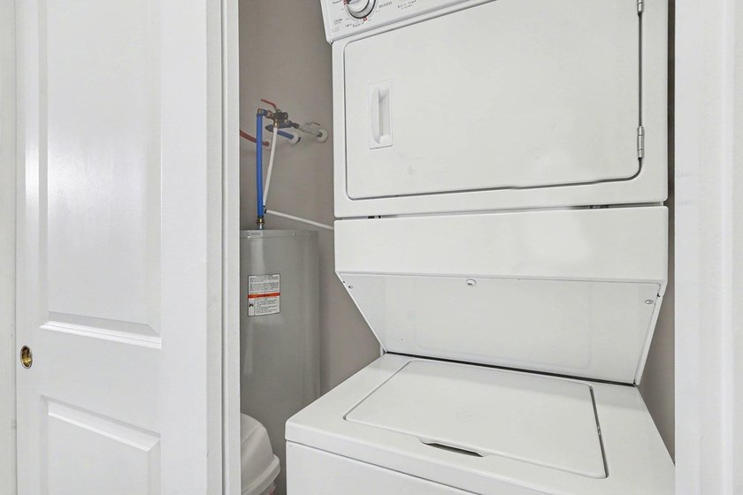 Welcome to this beautifully furnished third-floor condo located - photo 23