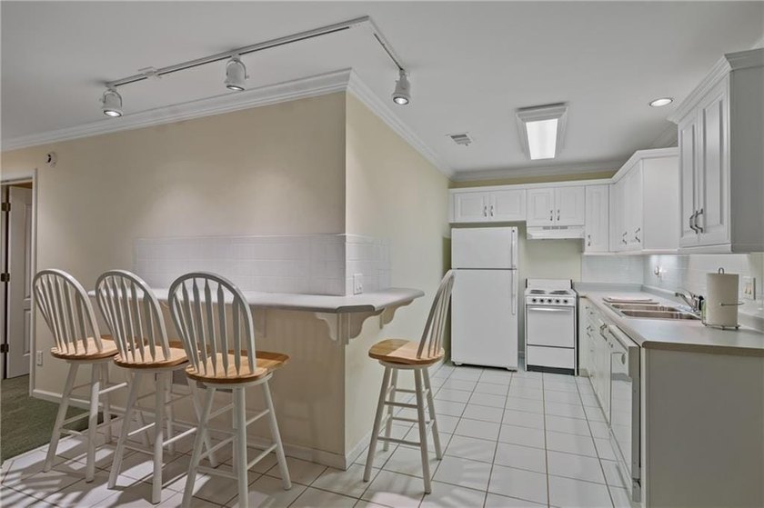Welcome to this exceptional custom-built home in the prestigious - photo 50
