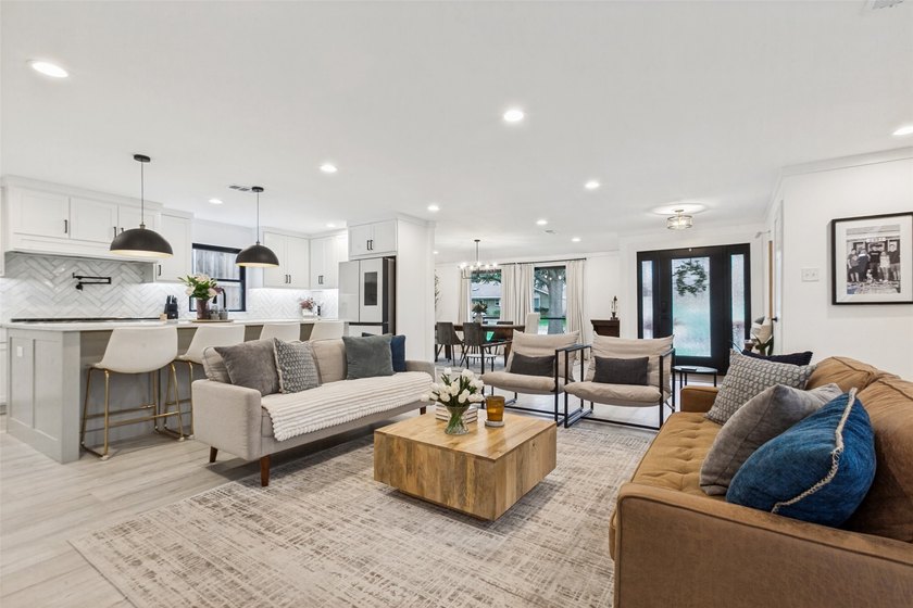 Welcome to 411 Ridgewood Dr, a fully reimagined 5-bedroom, 3 - photo 6