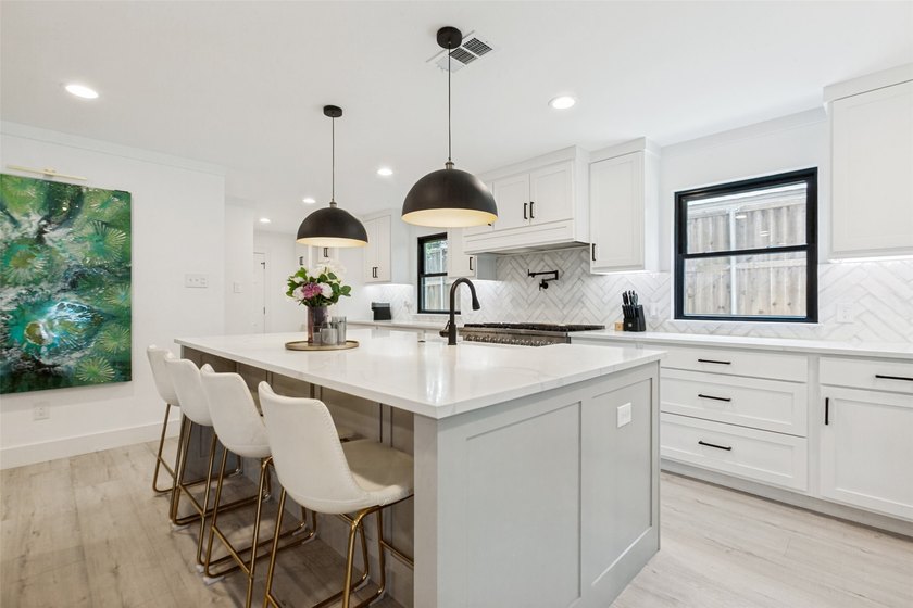 Welcome to 411 Ridgewood Dr, a fully reimagined 5-bedroom, 3 - photo 9