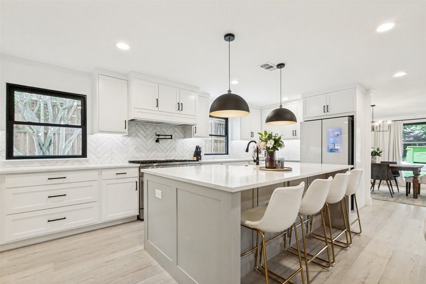 Welcome to 411 Ridgewood Dr, a fully reimagined 5-bedroom, 3 - photo 10
