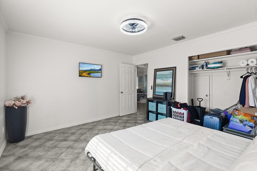 This renovated 2-bedroom, 2-bath condo has a newer roof (2022) - photo 11