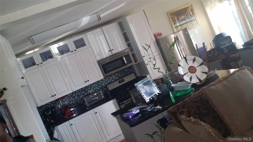 Well-maintained two-bedroom, one-and-a-half-bath condominium - photo 4