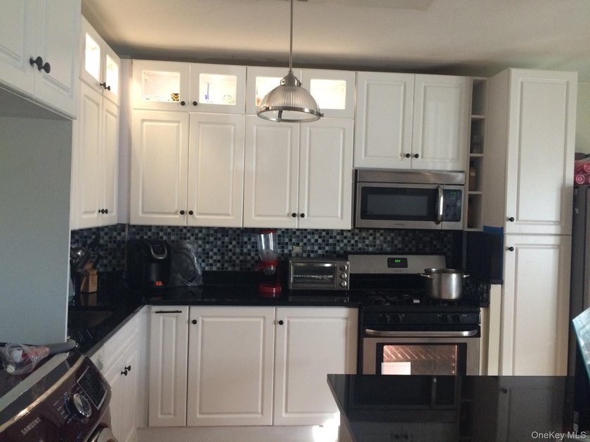 Well-maintained two-bedroom, one-and-a-half-bath condominium - photo 6