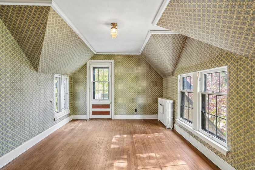 Set on a charming, tree-lined street in the heart of Fox Point - photo 13