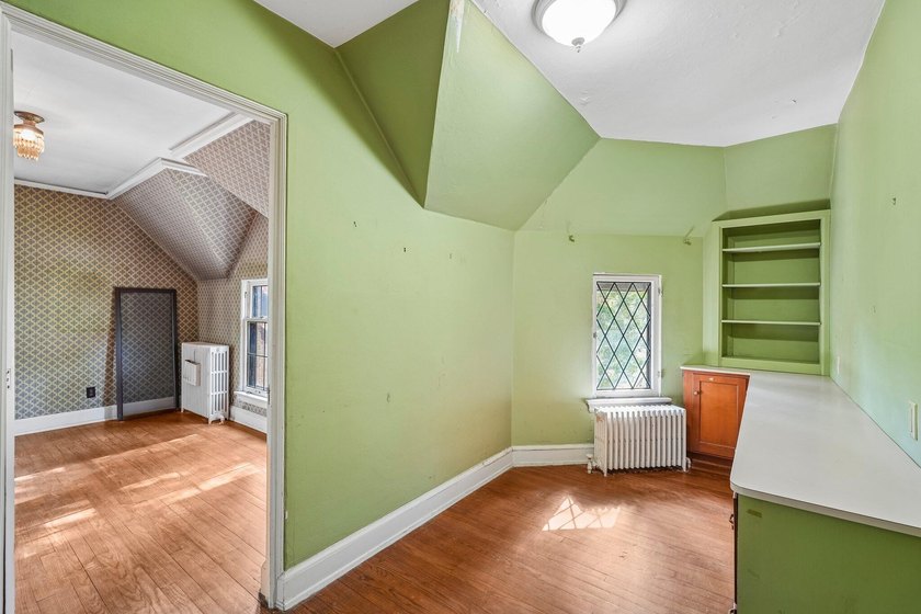 Set on a charming, tree-lined street in the heart of Fox Point - photo 14
