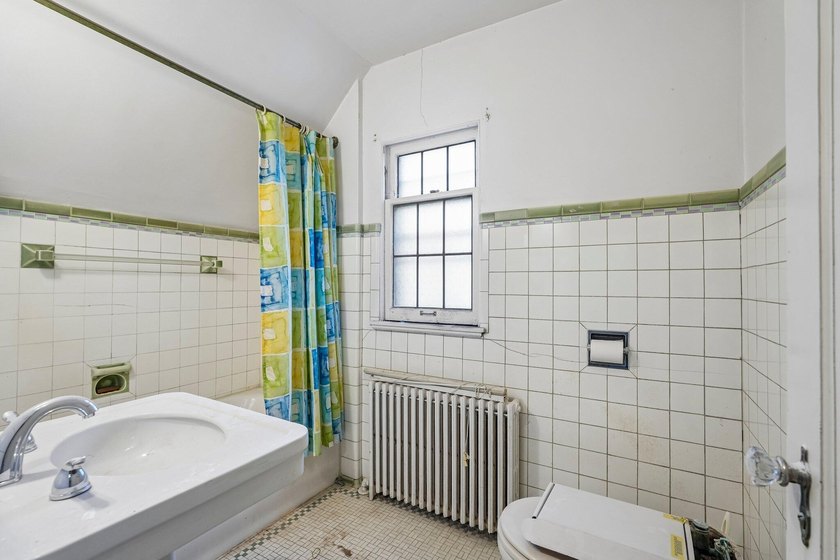 Set on a charming, tree-lined street in the heart of Fox Point - photo 16