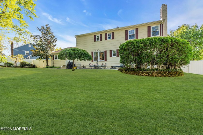 Welcome to this expansive 5-bedroom, 3 full bathroom home - photo 47