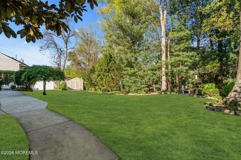 Welcome to this expansive 5-bedroom, 3 full bathroom home - photo 49