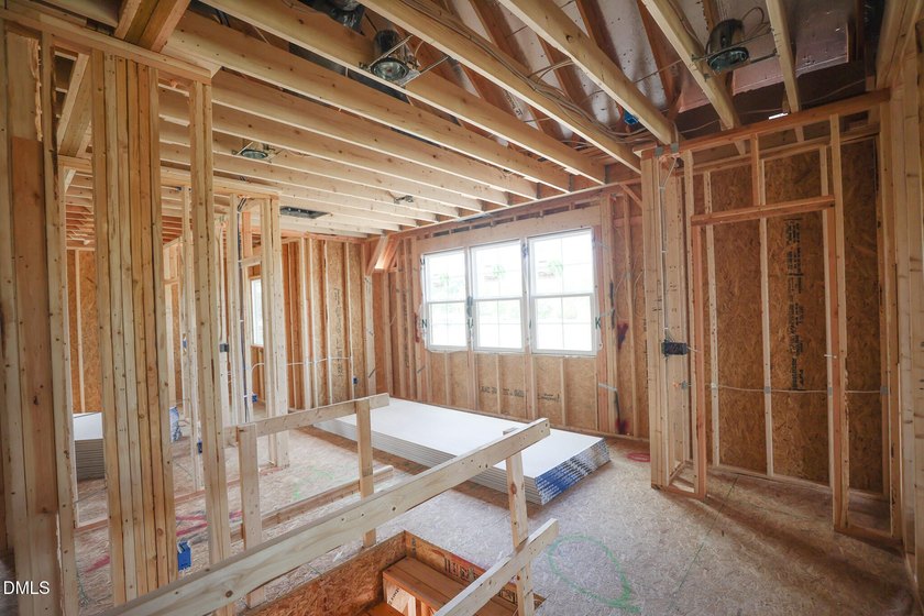 Custom-built by Ken Harvey Homes, with a RARE 4-CAR GARAGE! - photo 12