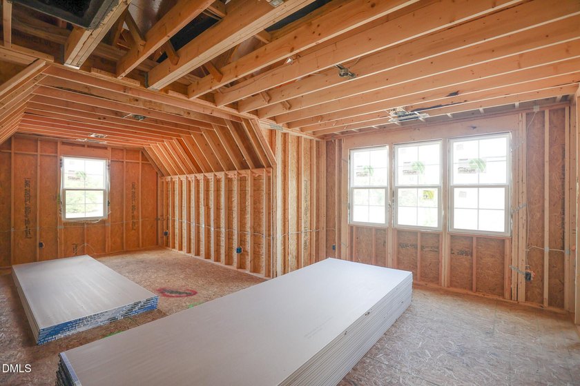 Custom-built by Ken Harvey Homes, with a RARE 4-CAR GARAGE! - photo 13