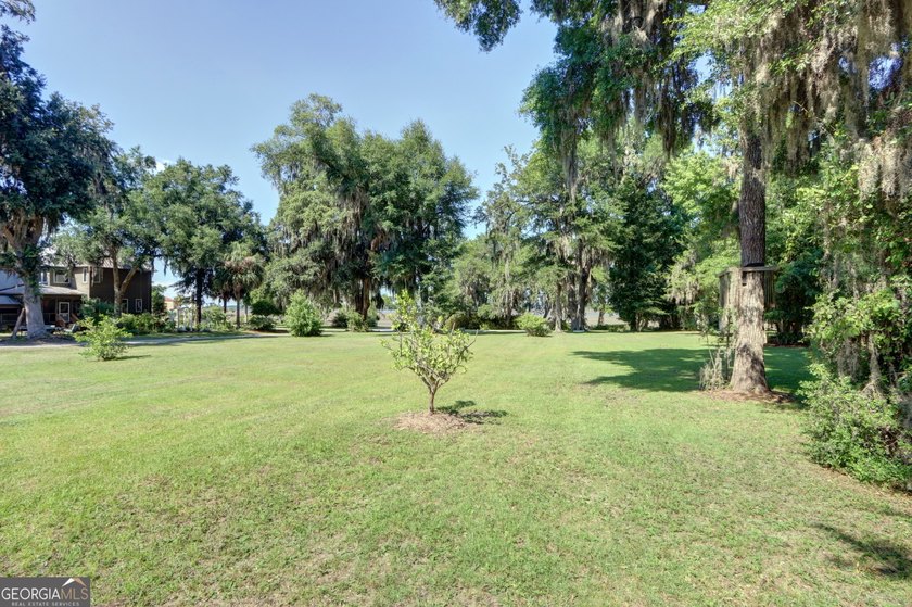 RARE OPPURTUNITY for highly desirable +/- 1/2 ACRE lot with - photo 11