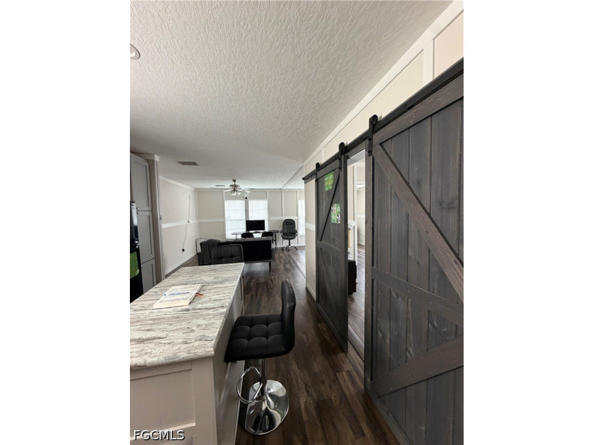 Welcome Home! Beautiful 2023 double-wide manufactured home is - photo 6