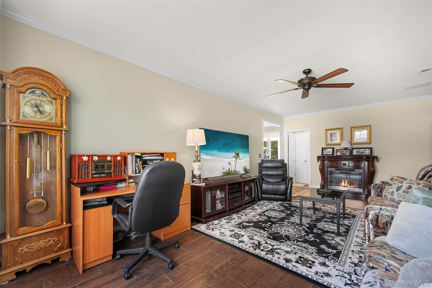 Exquisite custom-built Colonial elegantly positioned midblock on - photo 21