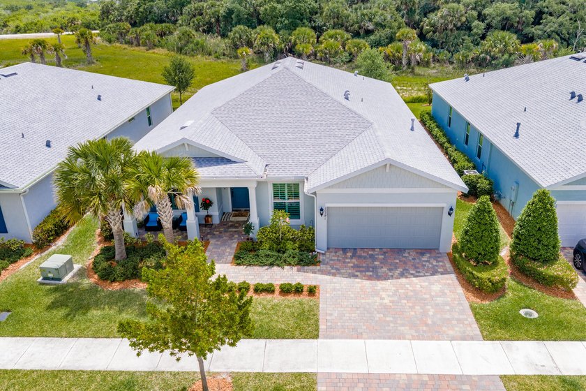 WOW!!! Like new 2022 smart energy-efficient home in Heron - photo 3