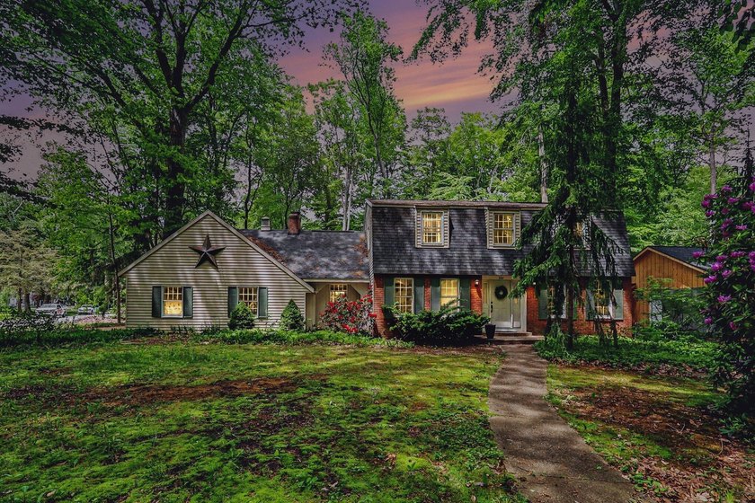 Welcome home to Merrigold Woods! This ideal location is just - photo 2
