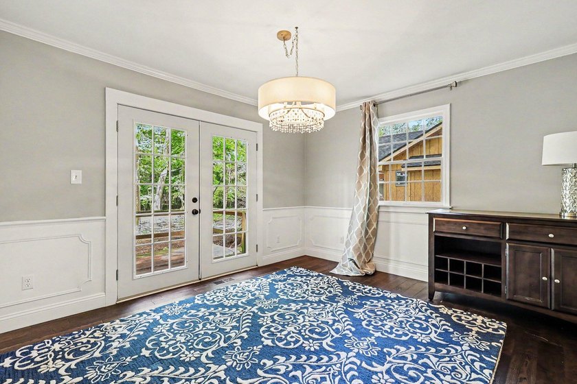 Welcome home to Merrigold Woods! This ideal location is just - photo 4