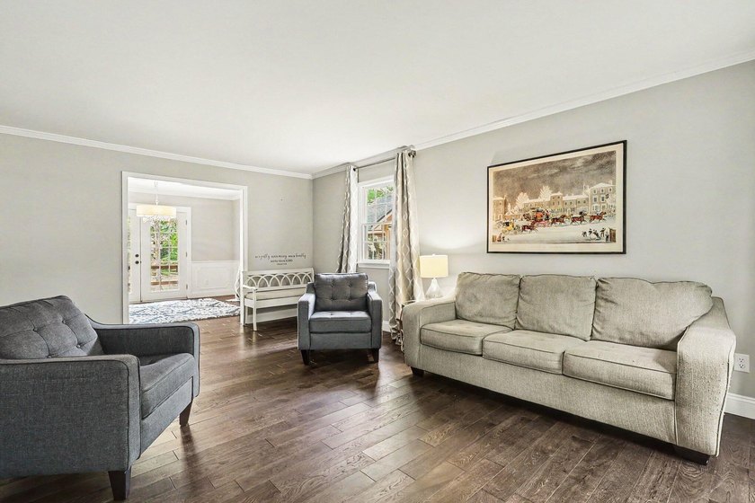 Welcome home to Merrigold Woods! This ideal location is just - photo 6