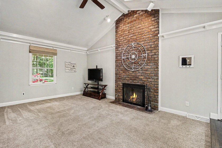 Welcome home to Merrigold Woods! This ideal location is just - photo 7