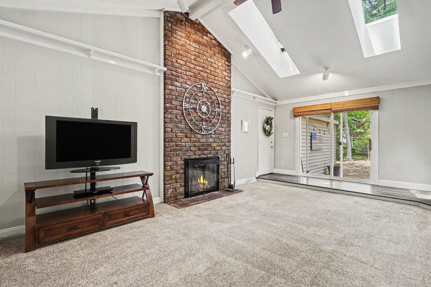 Welcome home to Merrigold Woods! This ideal location is just - photo 8