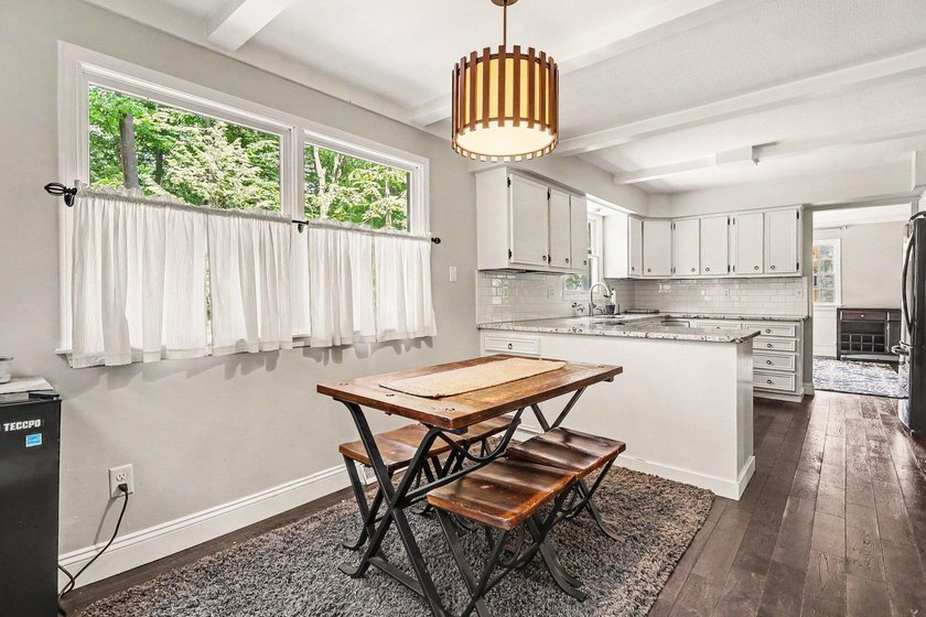 Welcome home to Merrigold Woods! This ideal location is just - photo 9