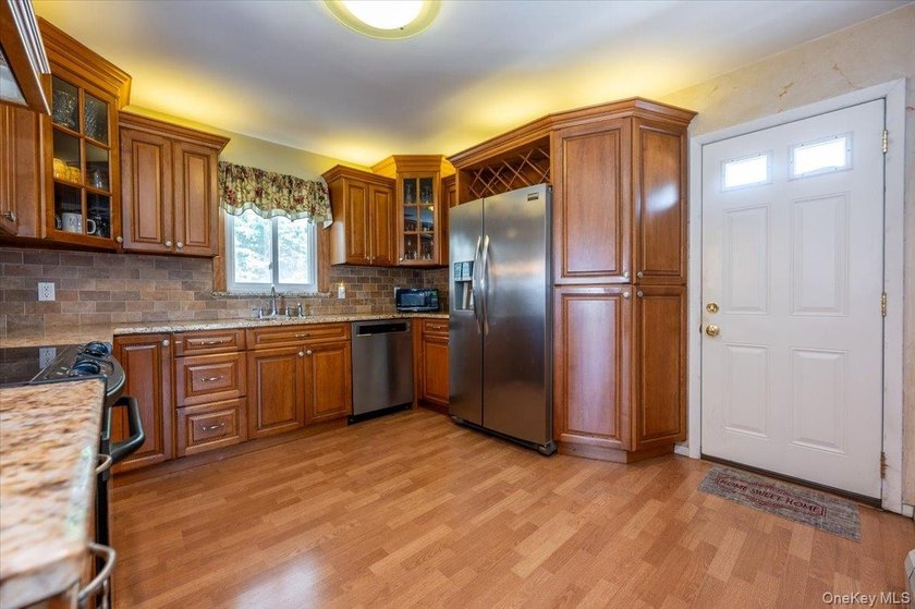 Expanded wide- line ranch set on a generous 75/150 property in - photo 11