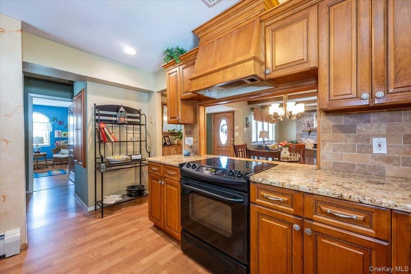 Expanded wide- line ranch set on a generous 75/150 property in - photo 12