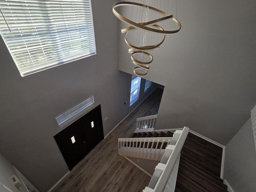 Beautiful 4-bedroom, 2.5-bath two-story lakefront home with a - photo 13