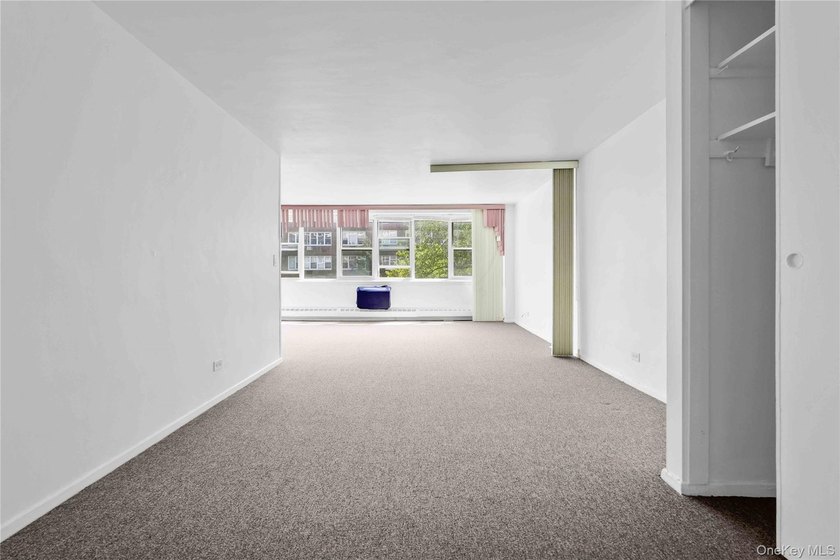 Welcome to this spacious and well-maintained co-op studio in the - photo 10