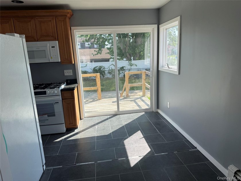 Beautiful Updated Split-Level Home on a Prime Corner Lot Welcome - photo 5