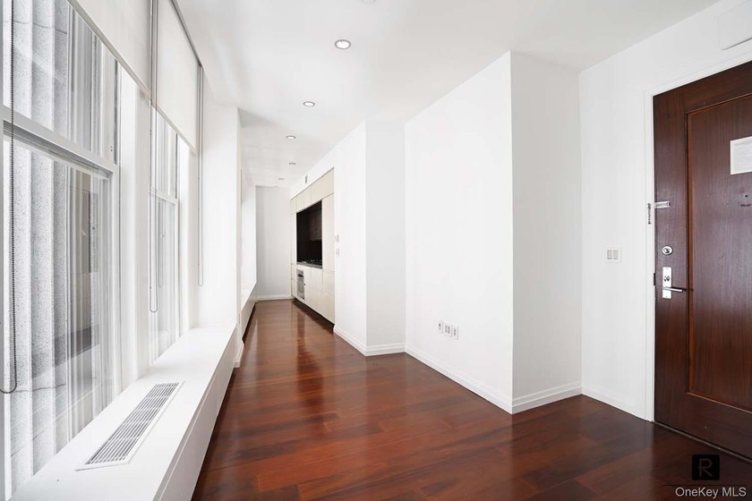Welcome home to this glamorous corner One Bedroom apartment at - photo 7