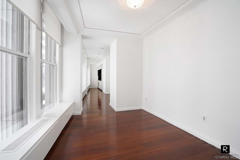 Welcome home to this glamorous corner One Bedroom apartment at - photo 8