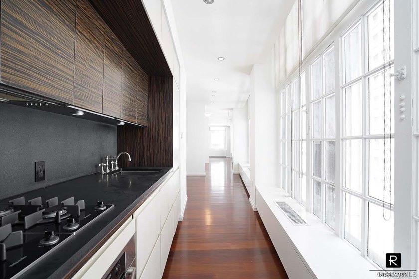 Welcome home to this glamorous corner One Bedroom apartment at - photo 10