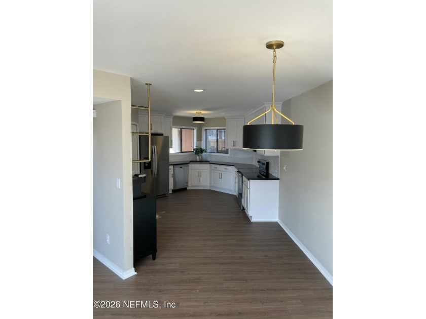 Step into 1159 Romaine Circle E, a fully renovated - photo 2