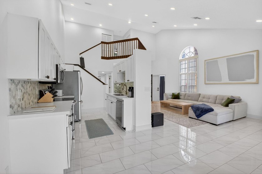 Modern, clean, and filled with natural light-this 3-bedroom, 2 - photo 4