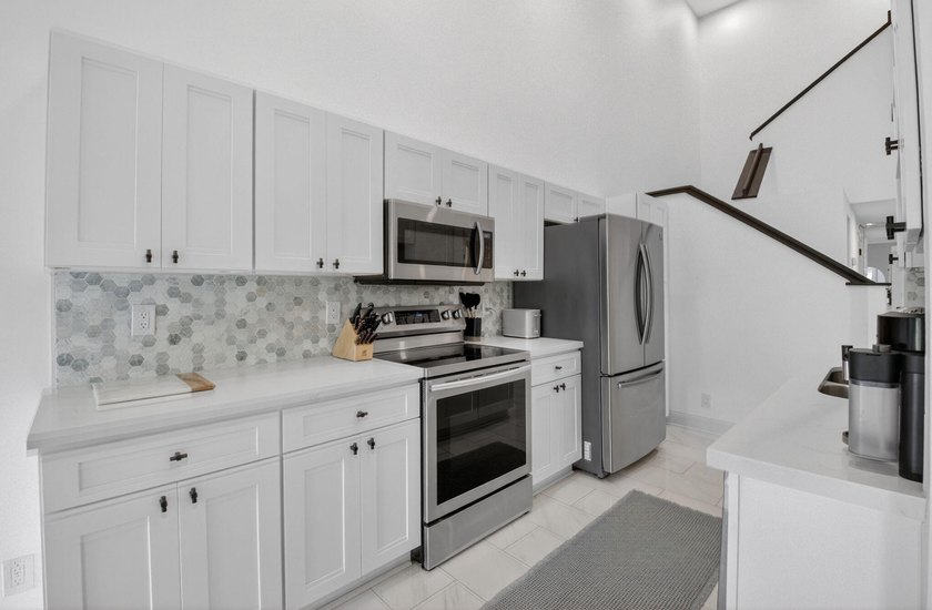 Modern, clean, and filled with natural light-this 3-bedroom, 2 - photo 5