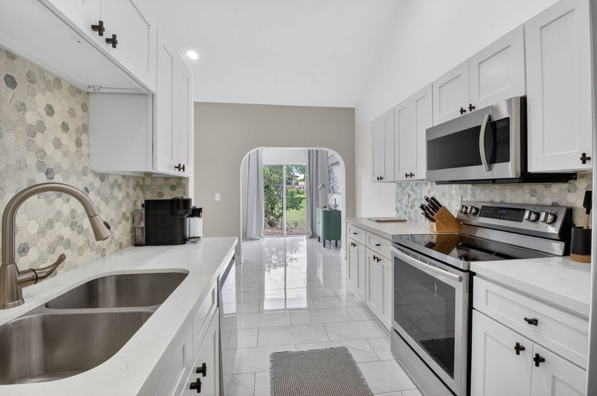 Modern, clean, and filled with natural light-this 3-bedroom, 2 - photo 6