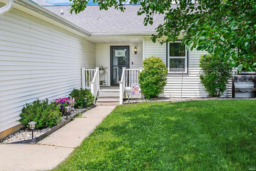 Four bedrooms, two baths, and 1,473 square feet with an open - photo 2