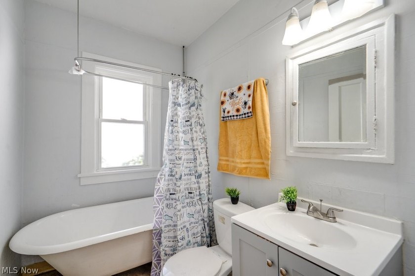 This maintained triplex is conveniently located just minutes - photo 5
