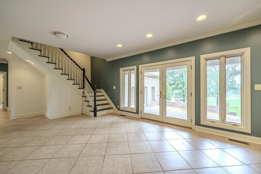 Welcome to this beautiful brick home perfectly situated on the - photo 7