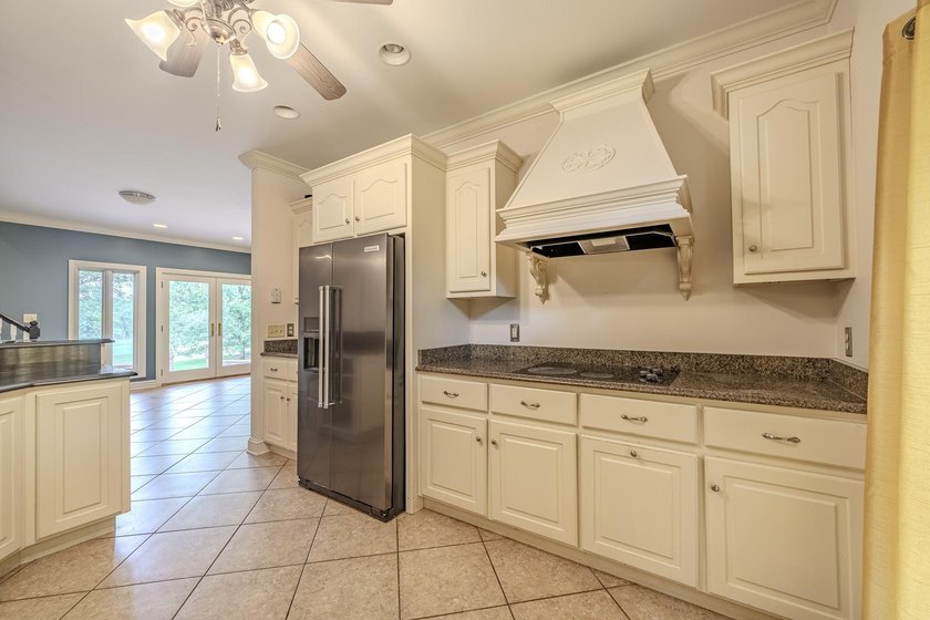 Welcome to this beautiful brick home perfectly situated on the - photo 8