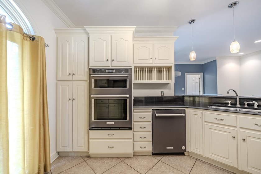 Welcome to this beautiful brick home perfectly situated on the - photo 10