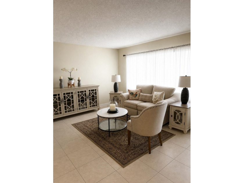 STEP INTO THIS BEAUTIFULLY MAINTAINED CONDO FILLED WITH WARMTH - photo 2