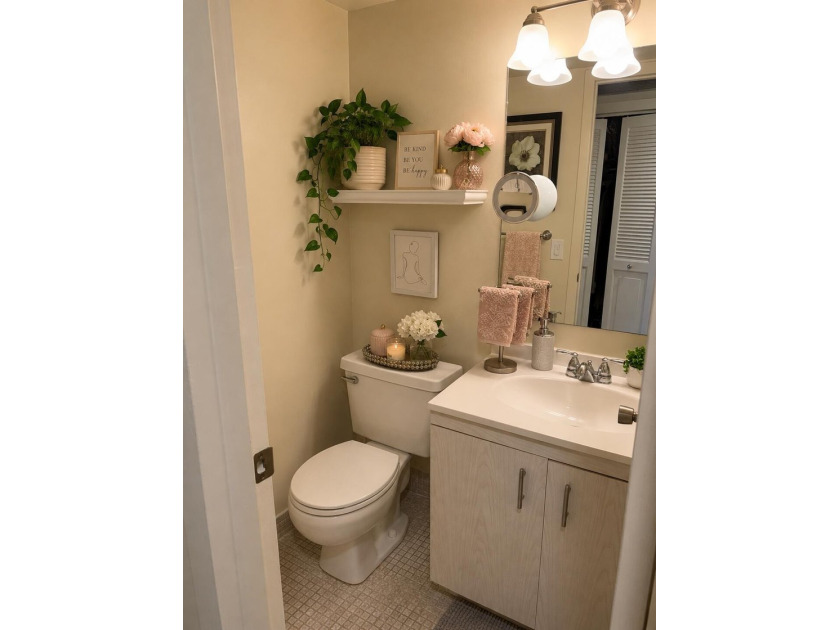 STEP INTO THIS BEAUTIFULLY MAINTAINED CONDO FILLED WITH WARMTH - photo 5