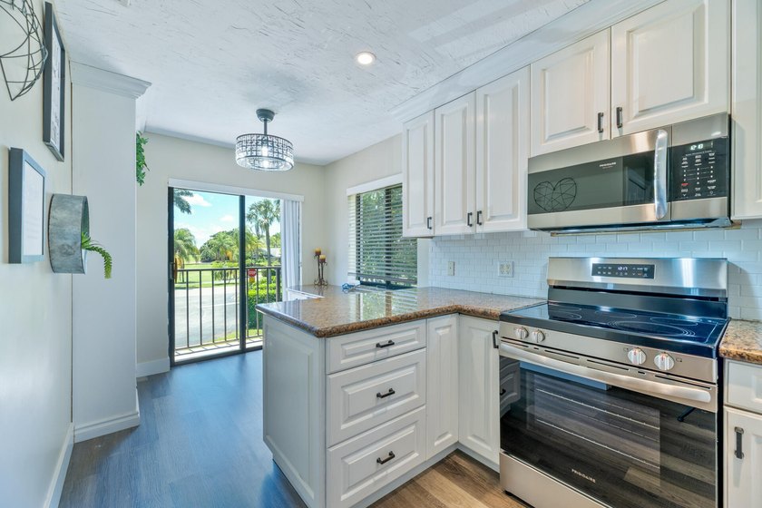 Welcome to this beautifully maintained two-story condominium in - photo 11