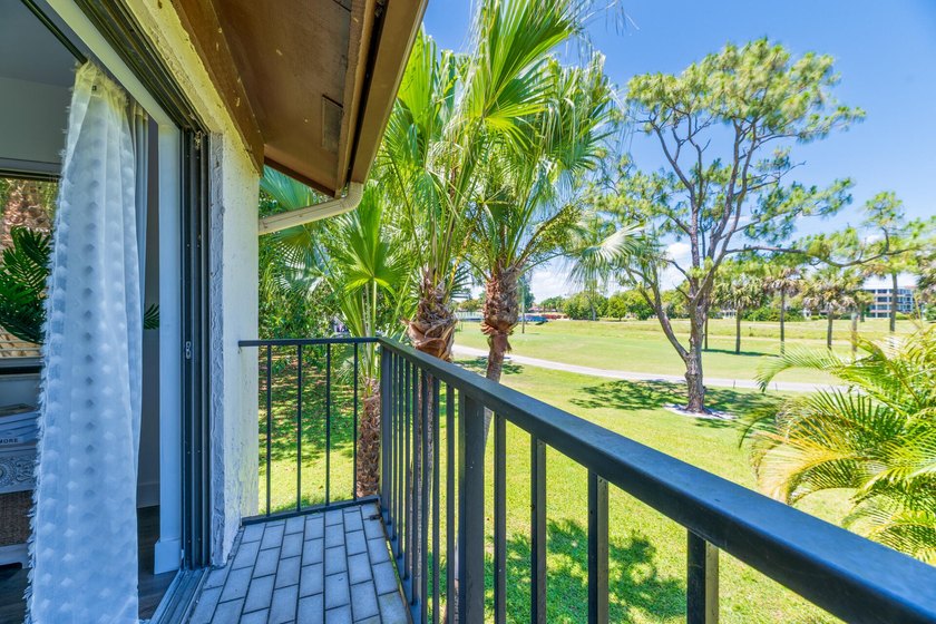 Welcome to this beautifully maintained two-story condominium in - photo 32