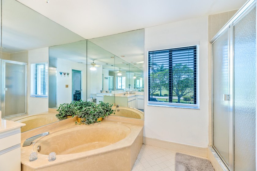 Welcome to this beautifully maintained two-story condominium in - photo 34